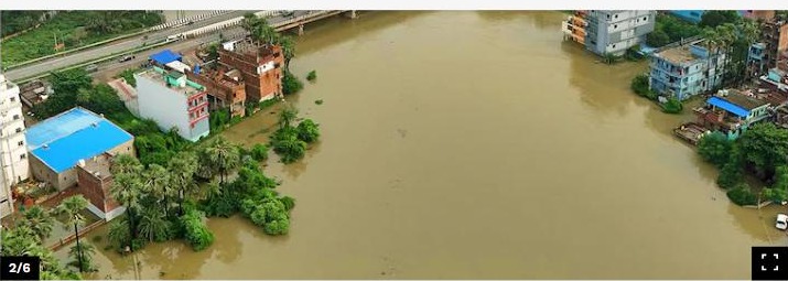 Aerial view of flooded Punpun town along the river in Patna